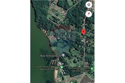 Terreno sobre asfalto camino a Itacua — foto principal
