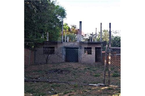 Terreno con construccion a terminar puerto pabla