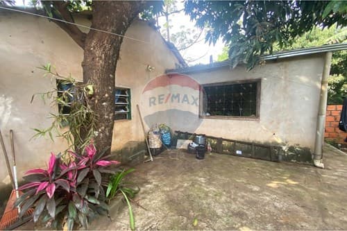 Terreno con casa a remodelar o demoler en km 9