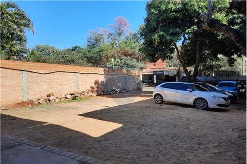 En venta terreno con tinglado generando renta