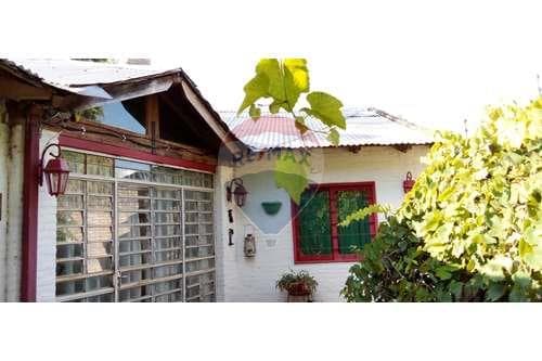 En Venta terreno con 2 casas en Capiatá