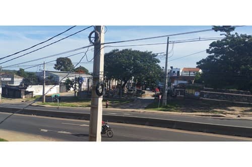 Terreno sobre acceso sur — foto principal