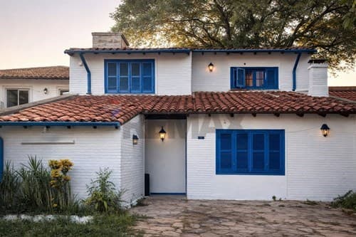 Terreno con construcción a refaccionar en Lambaré