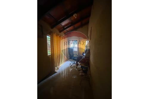 Terreno con casa a remodelar o demoler en km 9, foto 2