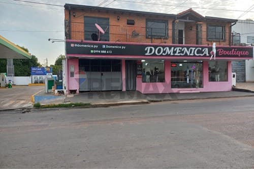 Propiedad con salón comercial y departamento — foto 3