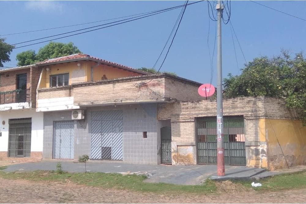 Vendo casa con salones comerciales en lambare