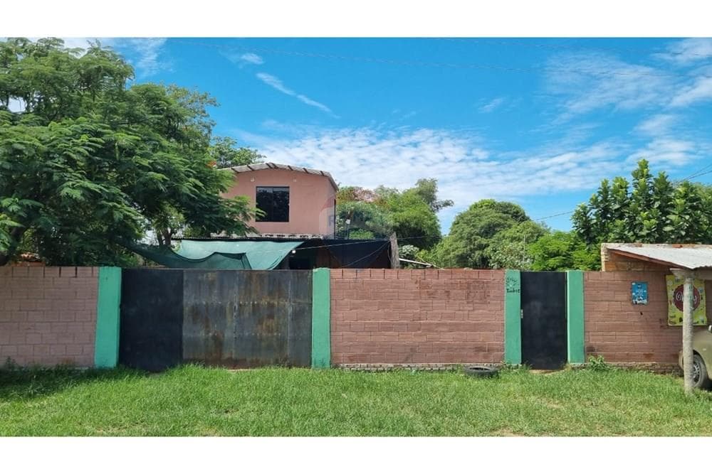 Amplio Terreno de 1.619 m² con Casa y Galpón en Benjamín Aceval, Costa Guazú, foto 1