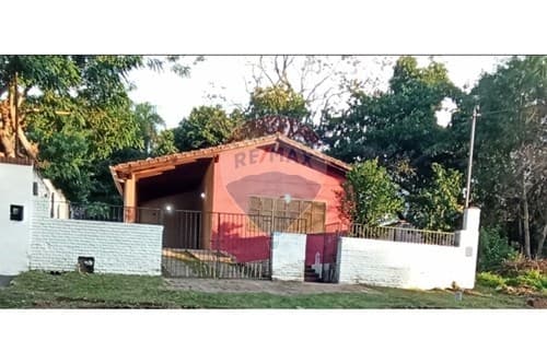 Vendo terreno con casa a refaccionar en lambare