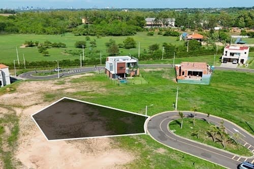 Terreno en isla bogado Luque — foto 1