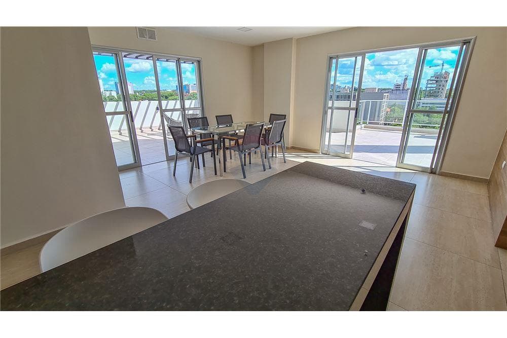 En venta departamento una hab home Villa Morra, foto 1