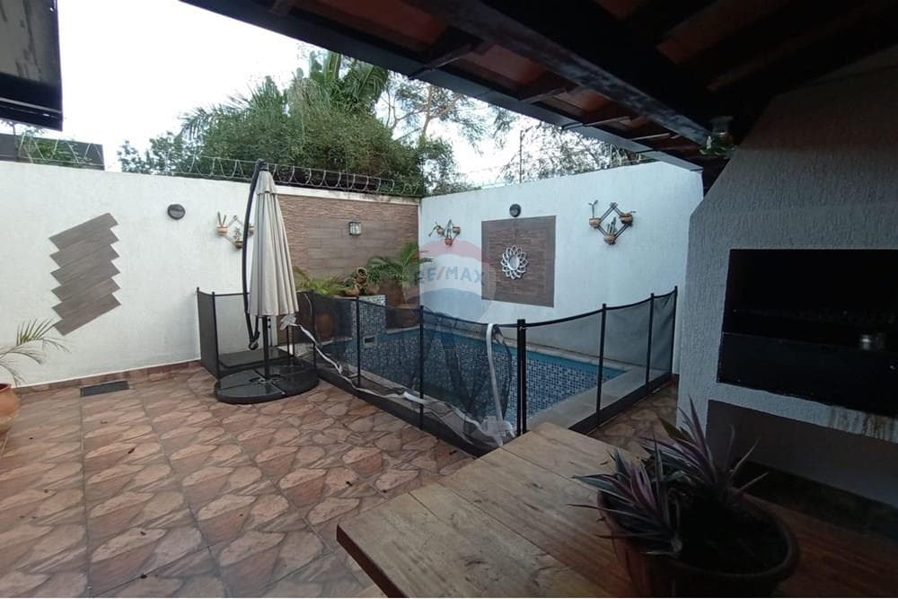 Casa con piscina en condominio, foto 2