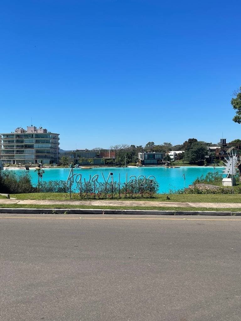 En venta hermoso lote en condominio en aqua village altos cordillera
