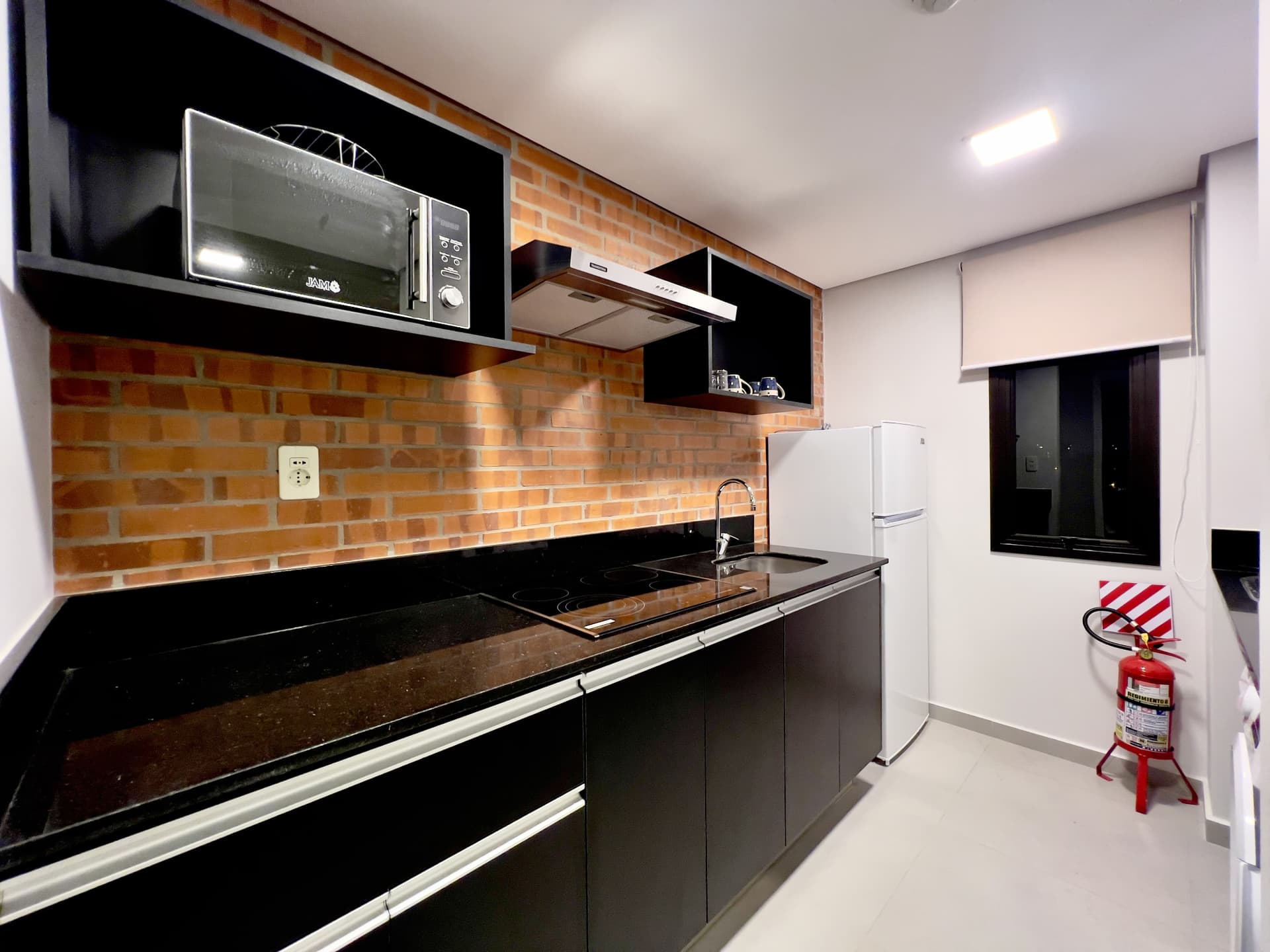 Ona cit, en venta, departamento amoblado de 2 dormitorios, con cochera, foto 3