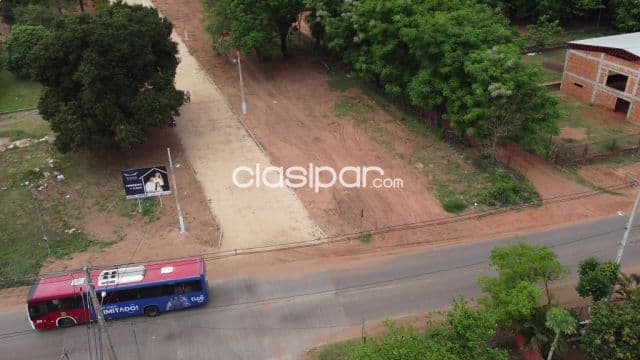 Terreno sobre ruta en esquina en el centro de YPANÉ — foto 1