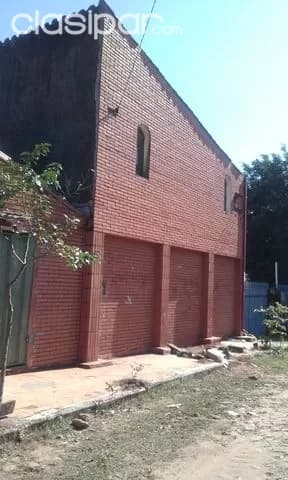 una pieza amplia con baño y lavatorio en el centro de lambare — foto 2