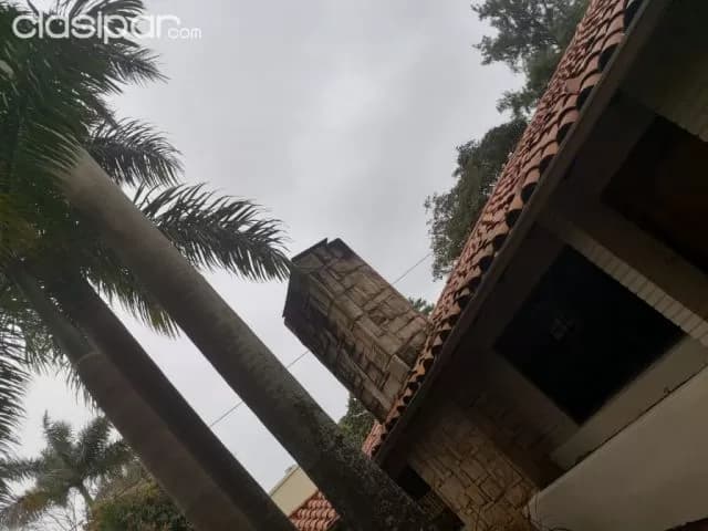 Los laureles: Residencia planta baja, 4 dormitorios, gran jardín, piscina, 10.000.000 gs, foto 3