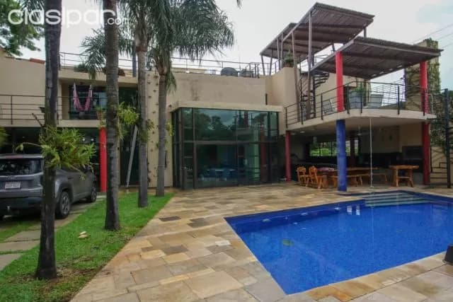 Mburucuyá: Elegante residencia minimalista, 5 dormitorios, jardín, piscina, 750.000 usd, foto 2