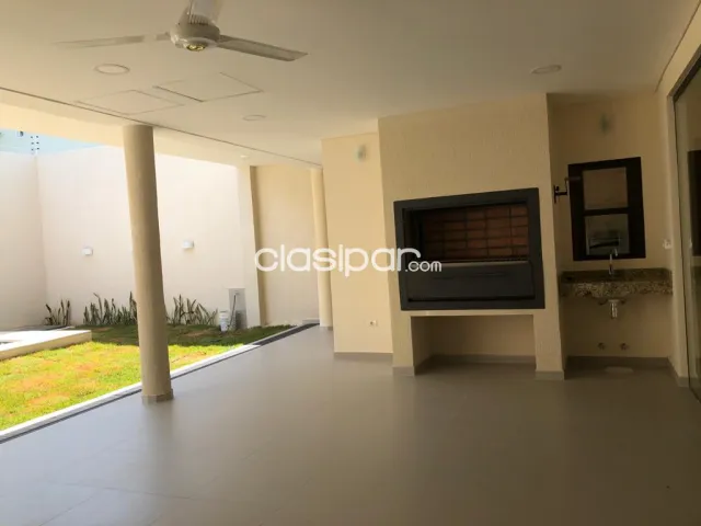 Prox. Univ. Americana (bº Jara): Elegante residencia minimalista, 4 suites, jardín — foto 4