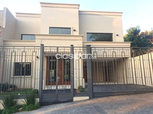 Mburucuya: Elegante residencia a estrenar, 4 suites, jardín c/ piscina – 2.500 usd