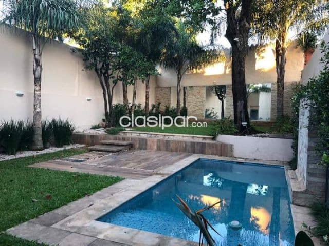 Prox. Wtc, la galería, ycua sati: Elegante residencia en venta, 4 suite, amplio jardín, foto 1