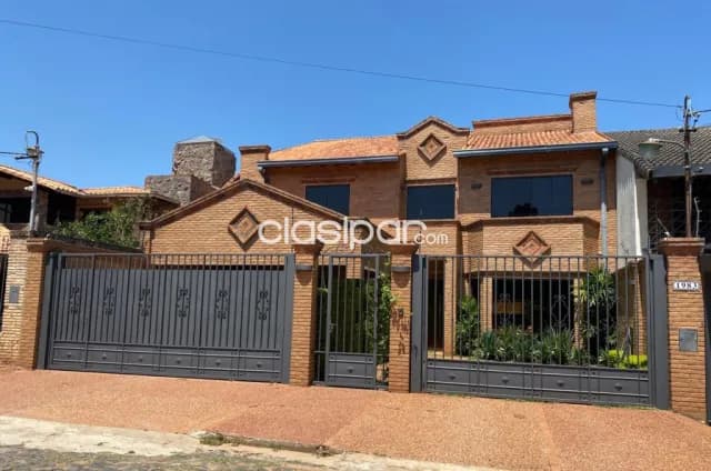 Mburucuyá (Carmelitas, casa rica II): Elegante residencia, 4 suites, ubicación ideal — foto 2