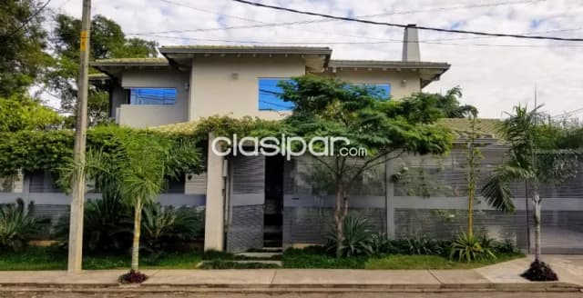 Villa Morra: Elegante residencia en venta, 5 suites. Jardín, piscina, 1.100.000 usd — foto 2