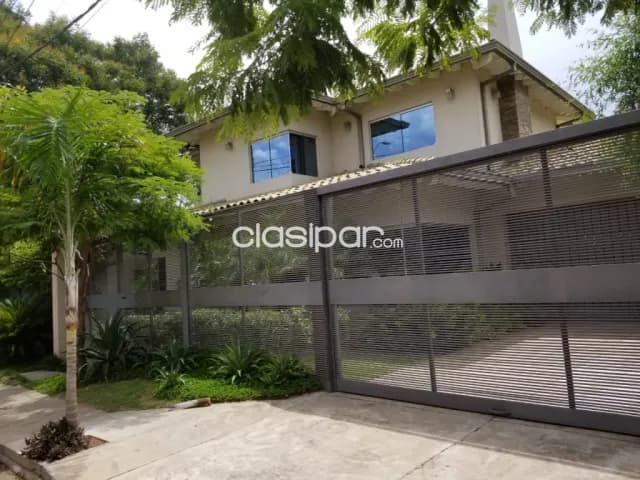 Villa Morra: Elegante residencia en venta, 5 suites. Jardín, piscina, 1.100.000 usd — foto 3