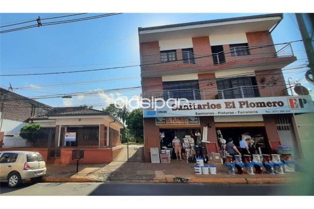 casa con edifico de 2 plantas en pleno centro de Encarnación: 3 habitaciones, foto 1