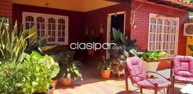 casa con salón comercial en capiata. E2499, foto 4