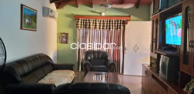casa con salón comercial en capiata. E2499, foto 5