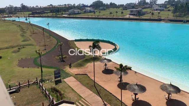 En venta hermoso Lote en el Condominio Blue Lagoon de P. Juan Caballero — foto 3