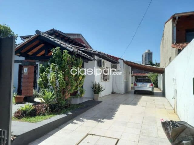 Terreno con casa en Herrera