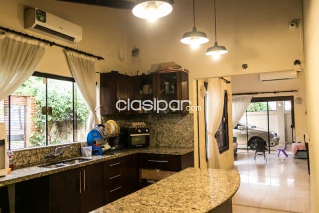 Residencia de una planta en esquina, foto 1