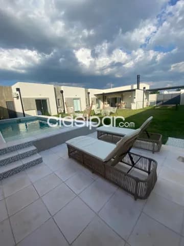Sanber: Puerta del lago: Casa amoblada en planta baja, jardín, piscina, 145.000 usd — foto 2