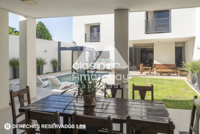 Casa con 4 dormitorios + quincho y piscina. Lambaré, zona avda. Del yacht, foto 4