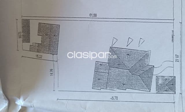 Terreno con construcción en venta zona Mburicao