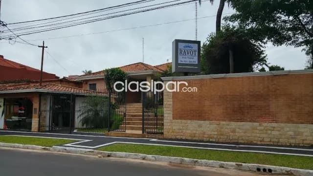 Terreno con construcción en venta zona Mburicao, foto 3