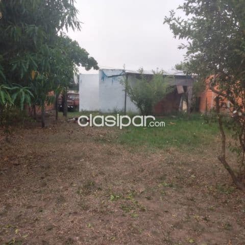 terreno en Limpio, con pieza y baño