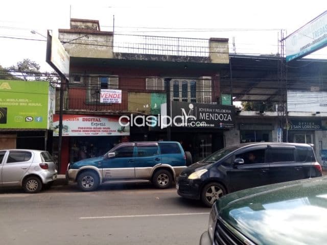 En pleno centro de San Lorenzo. Edificio Dpto con salones comerciales!