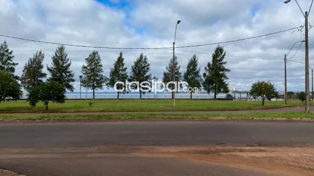 Terreno ubicado frente a la costanera del barrio Mboi Ka’e, foto 5