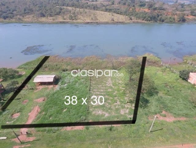 sobre el Rio Acaray del km 12, dos terrenos juntos
