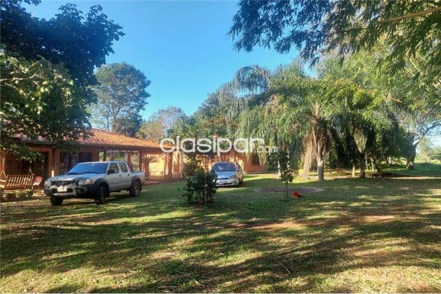 Terreno a 180 mtrs de villeta-nueva italia, cuenta con casa de 2 hab y area de huesp