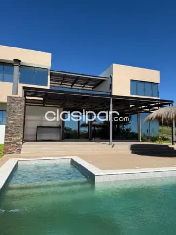 Se vende Casa de 4 Dormitorios en suite, con vista al Lago. Amoblada, foto 3