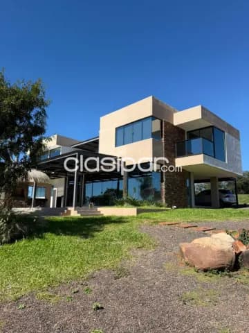 Se vende Casa de 4 Dormitorios en suite, con vista al Lago. Amoblada, foto 4