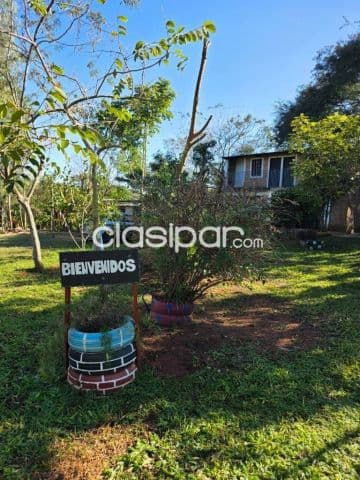 Casa con amplio terreno en itauguá — foto principal