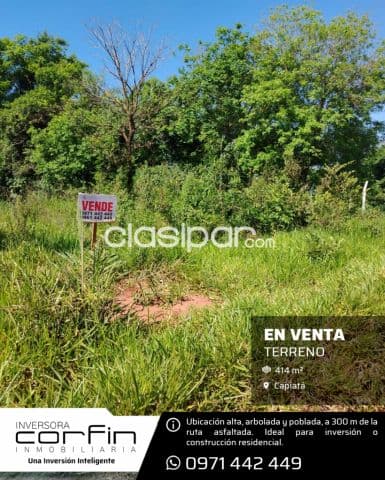 Capiatá: Terreno de 414 m² en zona toledo cañada, plano, alto y arbolado — foto principal