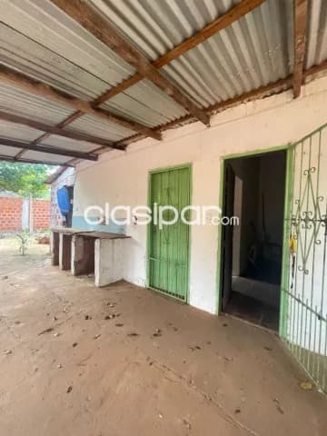 Terr eno 12x30 con casa especcial p/ inversión zona isla bogado gs.230.000.000..⁵, foto 2
