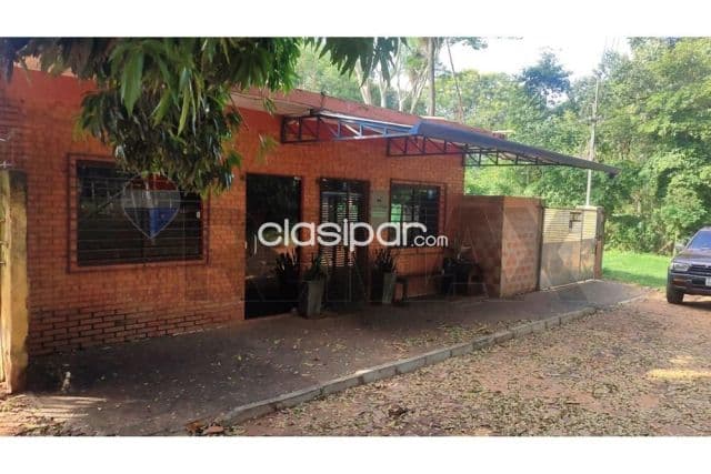 CASA CON SALONES COMERCIALES EN San Lorenzo 🏡✨ Propiedad para vivienda y potencial — foto 1