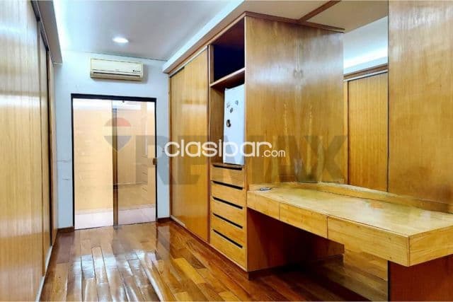 Residencia de lujo en barrio mariscal estigarribia con sala de cine