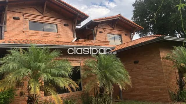 Mburucuyá, prox. Sma. Trinidad: Elegante residencia en venta, 4 suites, elegantes ambiente, foto 4